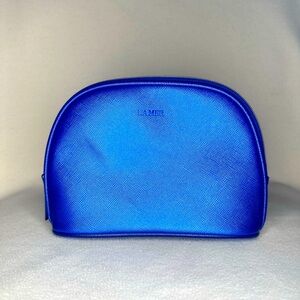 New La Mer Cosmetic Bag. Beautiful bright blue color.